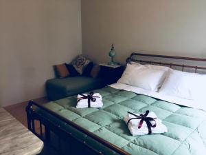 Ένα ή περισσότερα κρεβάτια σε δωμάτιο στο Casa Bertocco