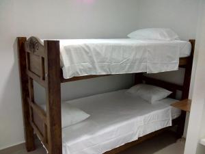 Postel nebo postele na pokoji v ubytování Hostal Casa de Barajas