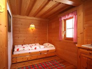 Postel nebo postele na pokoji v ubytování Die Petzl Hütte - Kreischbergblick