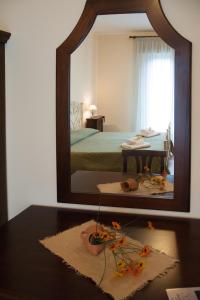 Posteľ alebo postele v izbe v ubytovaní Le Giare B&B