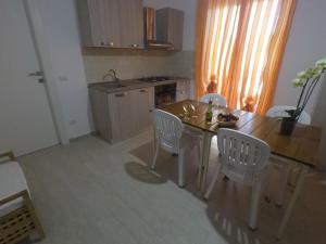 Kuchyň nebo kuchyňský kout v ubytování Holiday park Home