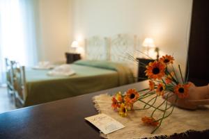 Posteľ alebo postele v izbe v ubytovaní Le Giare B&B