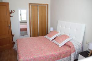Postel nebo postele na pokoji v ubytování Bungalow frente al mar