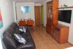 TV a/nebo společenská místnost v ubytování Bungalow frente al mar