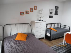 Łóżko lub łóżka w pokoju w obiekcie Stay99