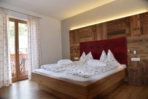 A bed or beds in a room at Residence Blumenthalerhof