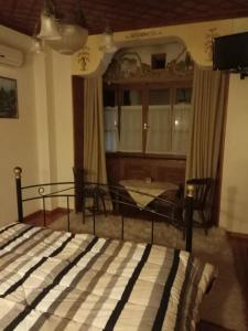 Posteľ alebo postele v izbe v ubytovaní Guesthouse Kolenti