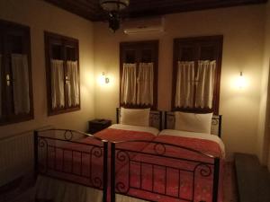 Posteľ alebo postele v izbe v ubytovaní Guesthouse Kolenti