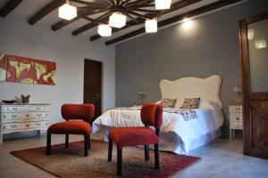 Una cama o camas en una habitación de Posada Boutique La Barrica