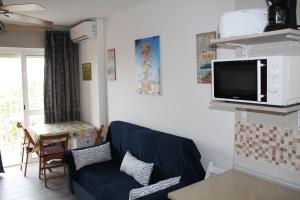 TV a/nebo společenská místnost v ubytování Benalmadena Aguila apartment wonderful views