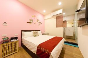 Giường trong phòng chung tại YOYO 11 House