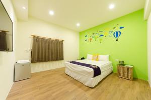 Giường trong phòng chung tại YOYO 11 House