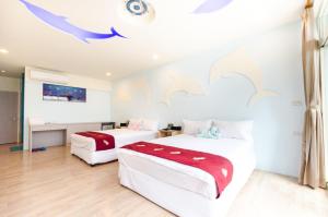 Giường trong phòng chung tại YOYO 11 House
