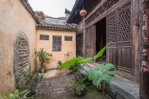 Fotografie z fotogalerie ubytování Laojia, a Qing dynasty house v destinaci Xingping