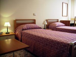 Posteľ alebo postele v izbe v ubytovaní Le Giare B&B