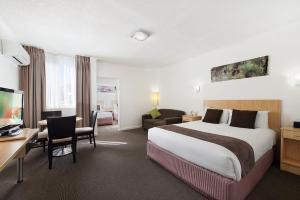 מיטה או מיטות בחדר ב-Comfort Inn Capital Horsham