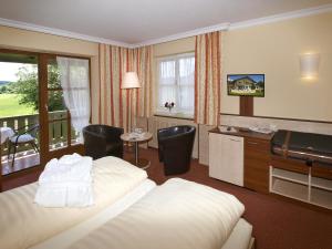 Postel nebo postele na pokoji v ubytování Xundheits Hotel Garni Eckershof