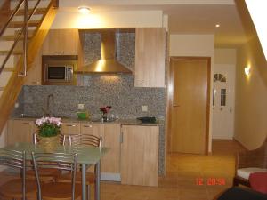 Kuchnia lub aneks kuchenny w obiekcie Duplex Playa de Rons
