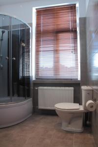 Kúpeľňa v ubytovaní Glam House Apartments