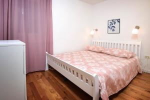 Postel nebo postele na pokoji v ubytování Villa Legacy