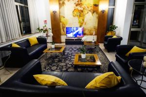 TV a/nebo společenská místnost v ubytování Hotel Palombella & Restaurant