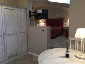 Kuchyň nebo kuchyňský kout v ubytování Alessi Hotel Trattoria