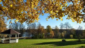 a gazebo in the middle of a park at Strömbäcks Vandrarhem in Umeå