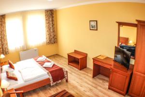 Postel nebo postele na pokoji v ubytování Hotel Járja