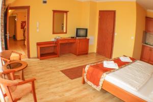 TV a/nebo společenská místnost v ubytování Hotel Járja