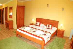Postel nebo postele na pokoji v ubytování Hotel Járja