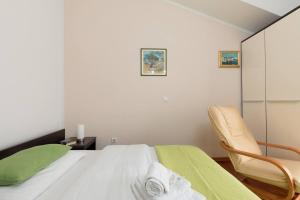 Cama o camas de una habitación en Apartments & Rooms Villa Maslina