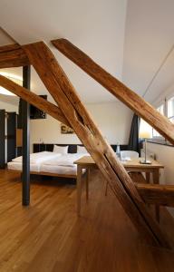 Postel nebo postele na pokoji v ubytování OX Hotel