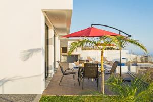 Balkón nebo terasa v ubytování Searenity Vacation Home II by An Island Apart