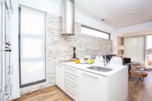 Kuchyň nebo kuchyňský kout v ubytování Yianna's Flat + 18 fotografií
