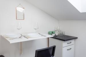 Kuchyň nebo kuchyňský kout v ubytování Classic Hotel