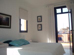 A bed or beds in a room at Bahia Meloneras Villa