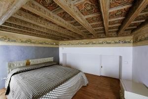 Postel nebo postele na pokoji v ubytování Turin Art Experience Bed & Breakfast