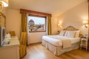 Postel nebo postele na pokoji v ubytování Hotel Atlantic Palace
