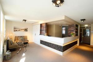 Posezení v ubytování Hotel De Boei + 36 fotografií