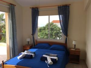 Ένα ή περισσότερα κρεβάτια σε δωμάτιο στο Villa Anthiana +32 φωτογραφίες