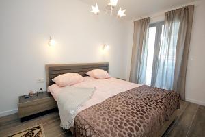 Apartment Melina客房内的一张或多张床位