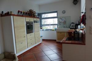 Kuchyň nebo kuchyňský kout v ubytování Rhönhaus mit Kreuzbergblick