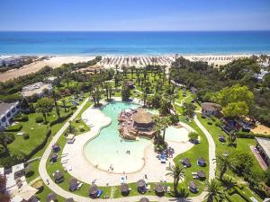 an aerial view of a resort with a pool and the beach at Sentido Phenicia in Hammamet