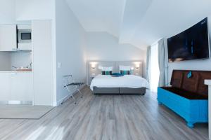 Cama o camas de una habitación en Auberge des Grands Bois