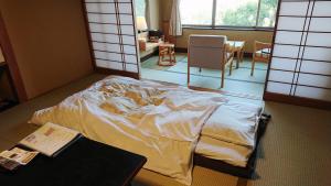 Llit o llits en una habitació de Yokikan