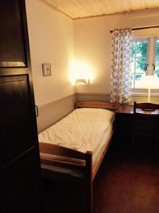 Letto o letti in una camera di Rättviksgårdens Vandrarhem