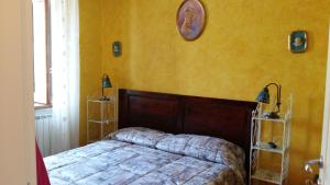 Postel nebo postele na pokoji v ubytování Borgo La Forgia