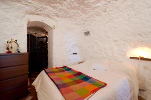 Posteľ alebo postele v izbe v ubytovaní La Constanza Casa Cueva