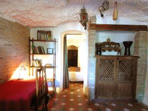 Posteľ alebo postele v izbe v ubytovaní La Constanza Casa Cueva