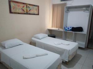 Ένα ή περισσότερα κρεβάτια σε δωμάτιο στο Hotel Imperial +11 φωτογραφίες